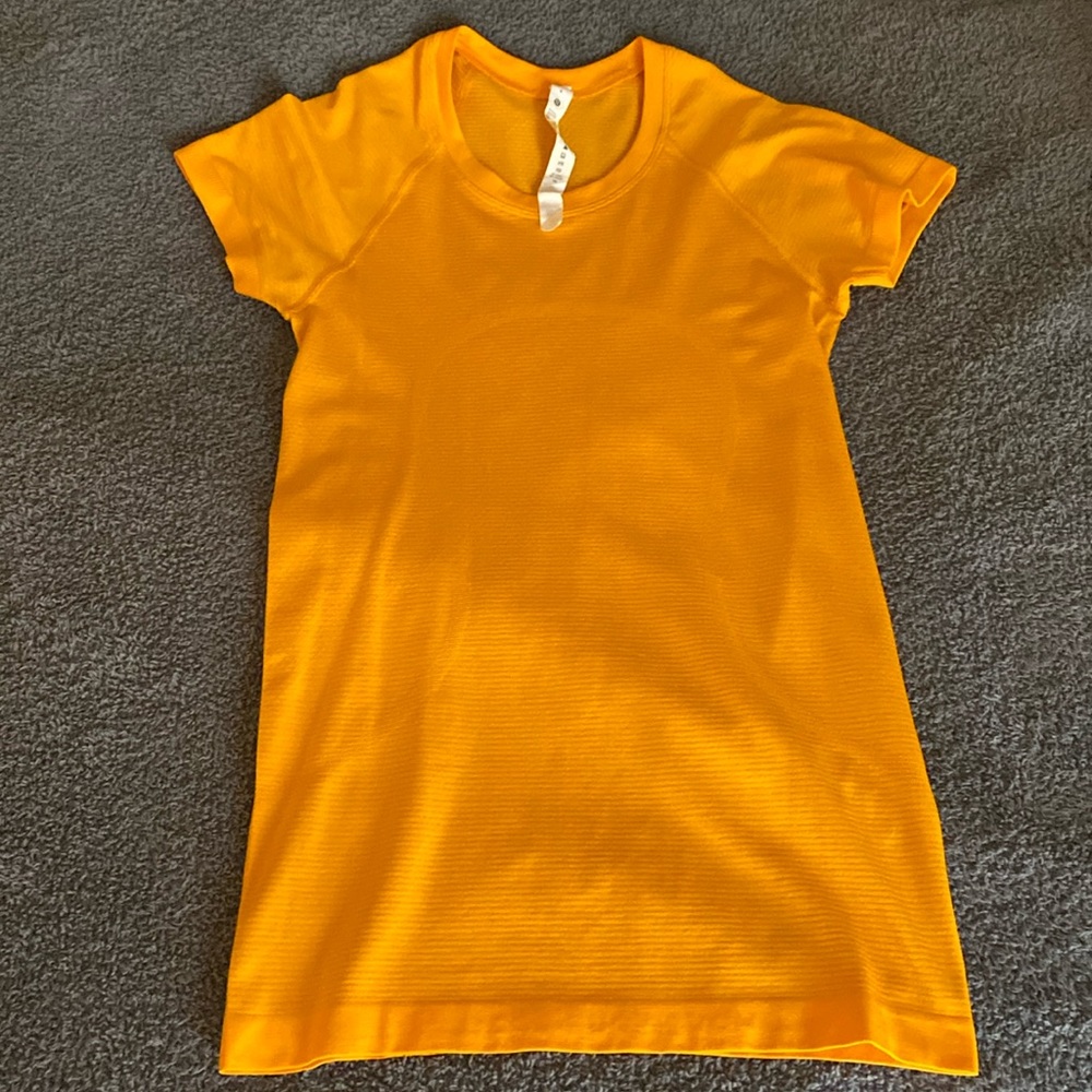 Orange Lululemon swiftly tech!